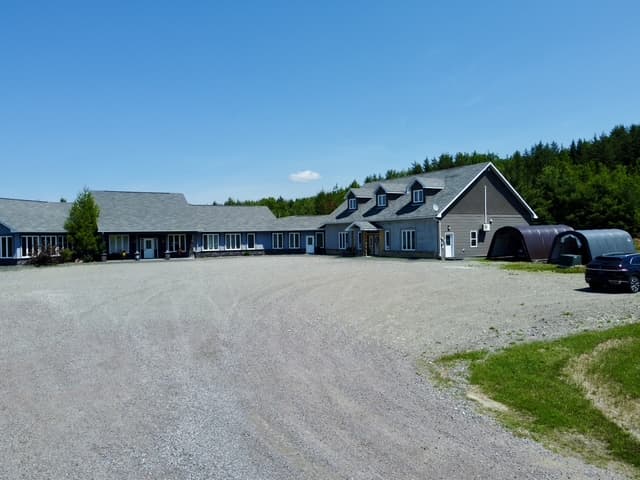 Exterior view of the property building and driveway